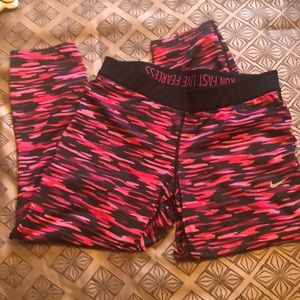 Nike Size Large pink and black leggings